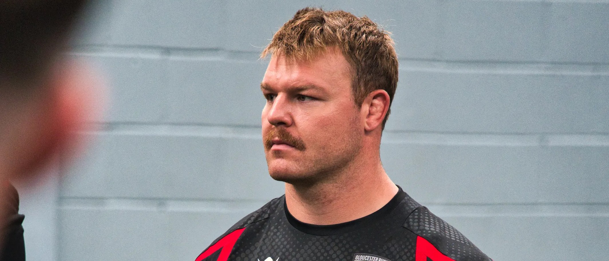 Dewi Lake wearing a Gloucester Rugby training top