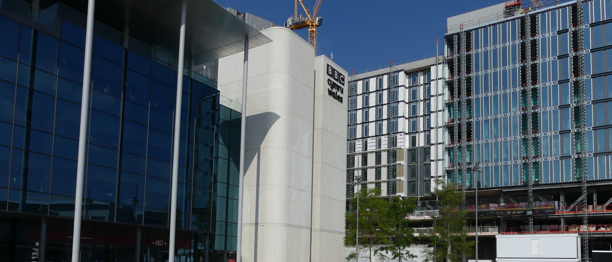 BBC Cymru Wales in Cardiff in September 2021, with the neighbouring transport interchange under construction. Archive photograph. Photo: Ruth Sharville, CC BY-SA 2.0, via Geograph and Wikimedia Commons; cropped.
