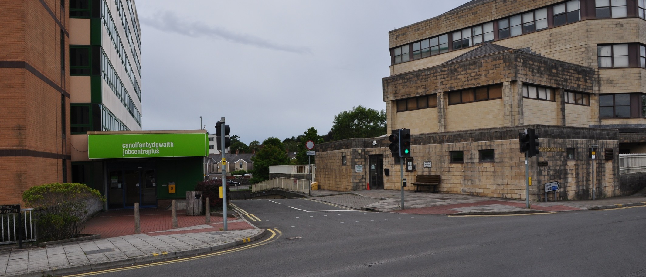 Angel Street, Bridgend, on 24 August 2014. Archive view of the area before the new health centre, not a photograph of the completed building. Lewis Clarke / Geograph and Wikimedia Commons, CC BY-SA 2.0; cropped.