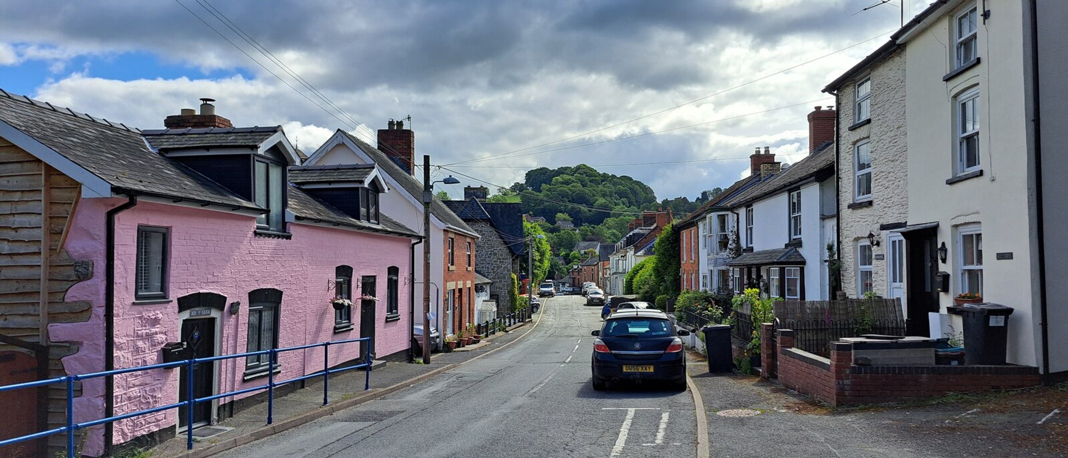 High Street, Llanfair Caereinion, 8 June 2024. Archive town photograph, not the school: Christopher Hilton, CC BY-SA 2.0, via Geograph and Wikimedia Commons.