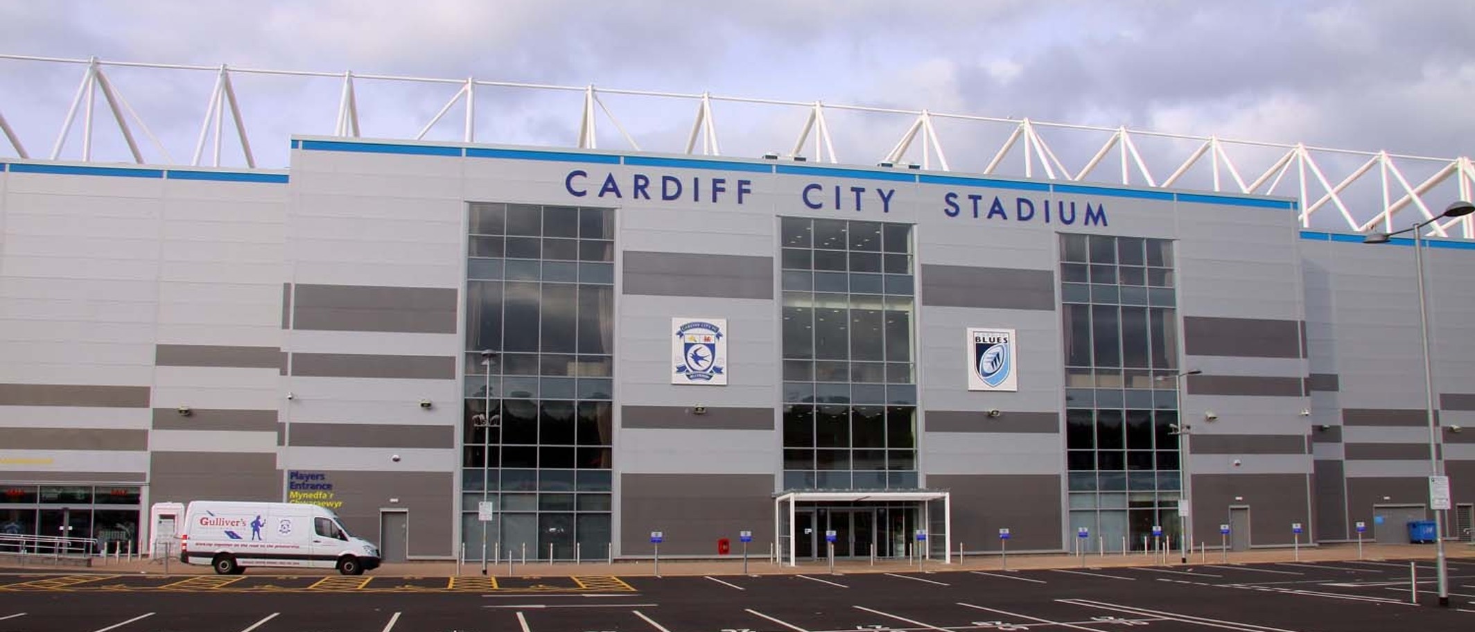 The front of Cardiff City Stadium. Photo: Steve Daniels, CC BY-SA 2.0, via Geograph (geograph.org.uk/photo/1974935) and Wikimedia Commons