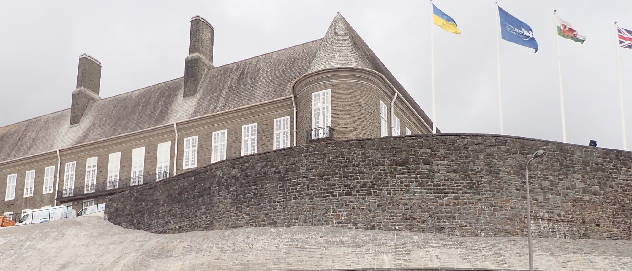 Archive: Carmarthen County Hall, 22 September 2022. Eirian Evans, CC BY-SA 2.0. Council context, not a fireworks seller or enforcement operation. Adjacent commercial premises cropped out.