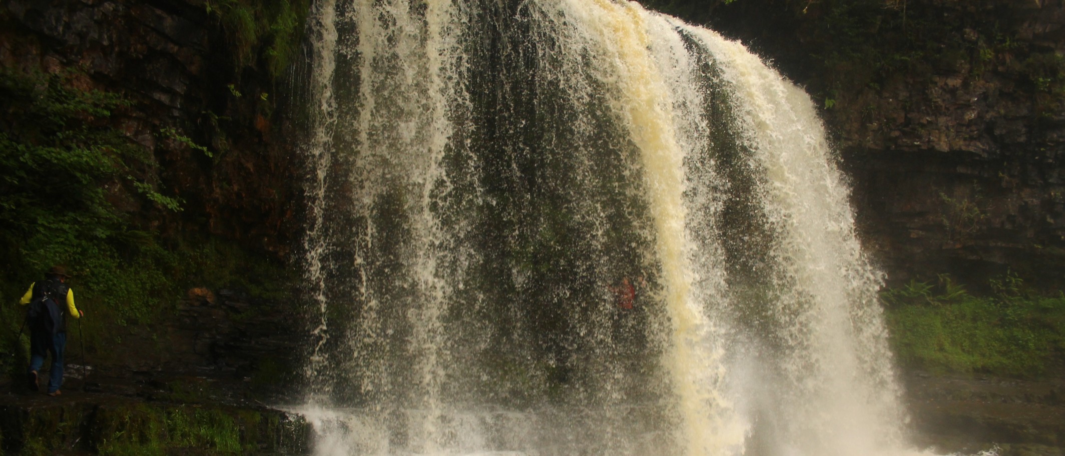Archive photograph of Sgwd yr Eira waterfall, June 2025. Photo: Tomrobsonphoto, CC BY-SA 4.0, via Wikimedia Commons
