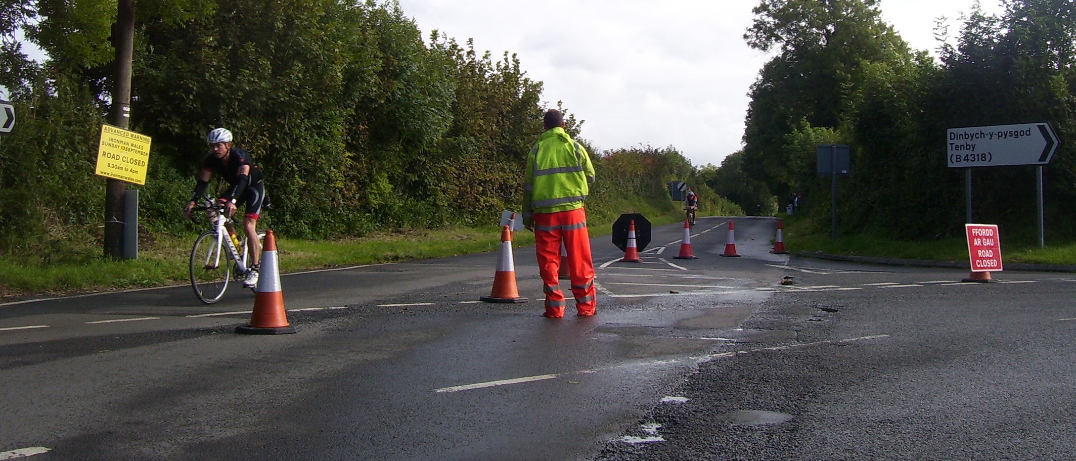 Archive IRONMAN Wales cycling at Sageston, 13 September 2015. Photo: welshbabe / Wikimedia Commons, CC BY-SA 2.0; cropped. Not the 2026 winners.