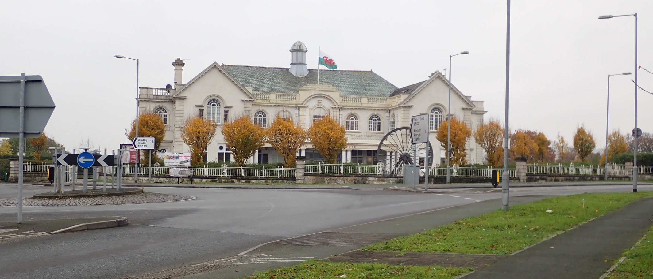Archive photograph of Llay Miners’ Welfare Institute in November 2018, shown as village context, not the café venue. Eirian Evans / Geograph via Wikimedia Commons, CC BY-SA 2.0; cropped.