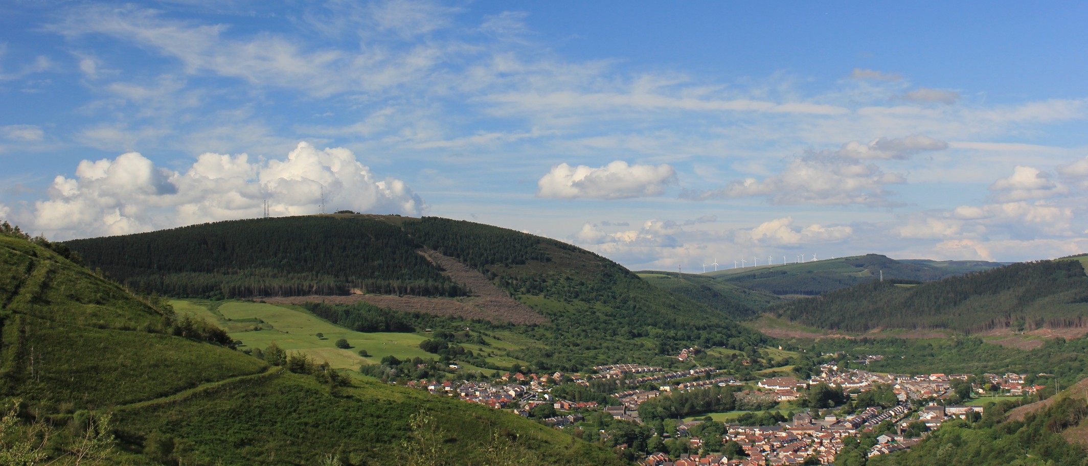 Cwmafan and the surrounding Afan Valley landscape. Archive context, not a photograph of completed restoration or an identified project site. Steve Hill / Panoramio and Wikimedia Commons, CC BY-SA 3.0; cropped.