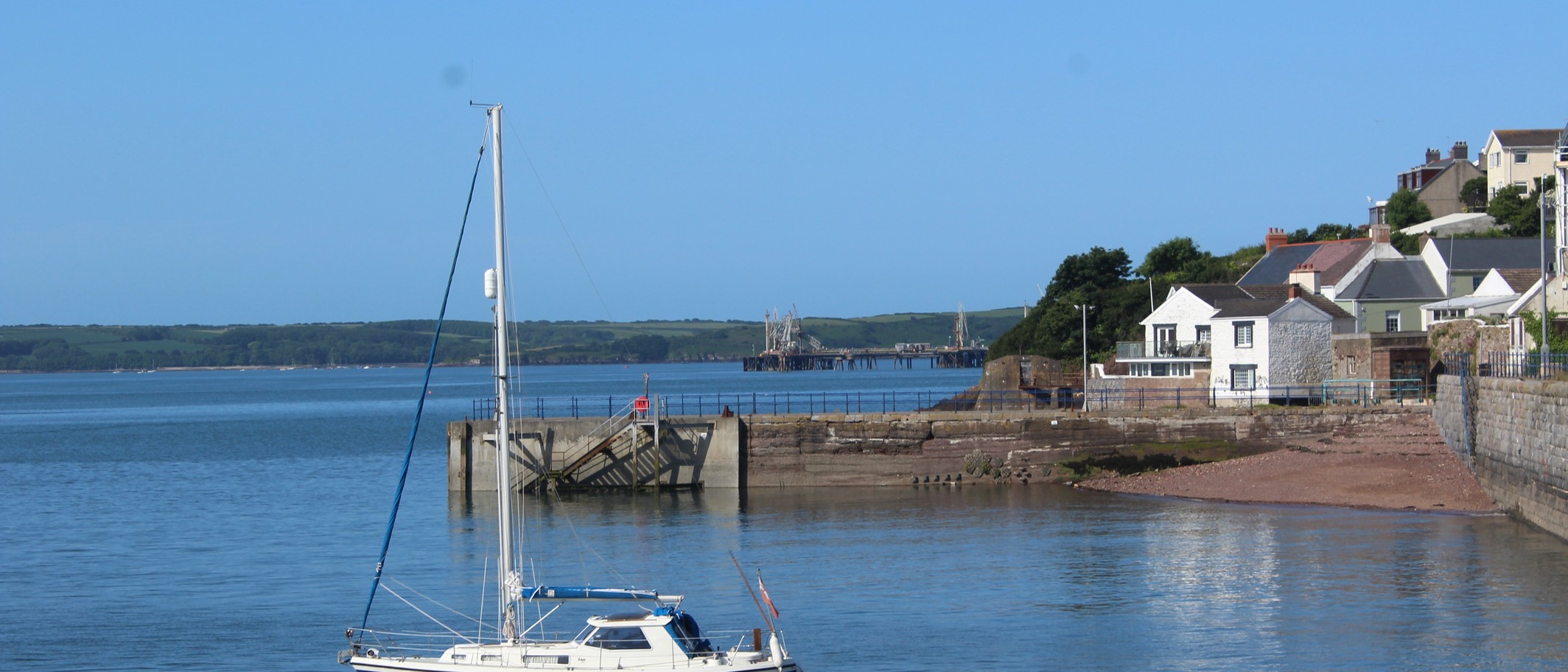 Yacht joining Milford Haven Waterway. Archive photograph: M J Roscoe, CC BY-SA 2.0, via Geograph and Wikimedia Commons.
