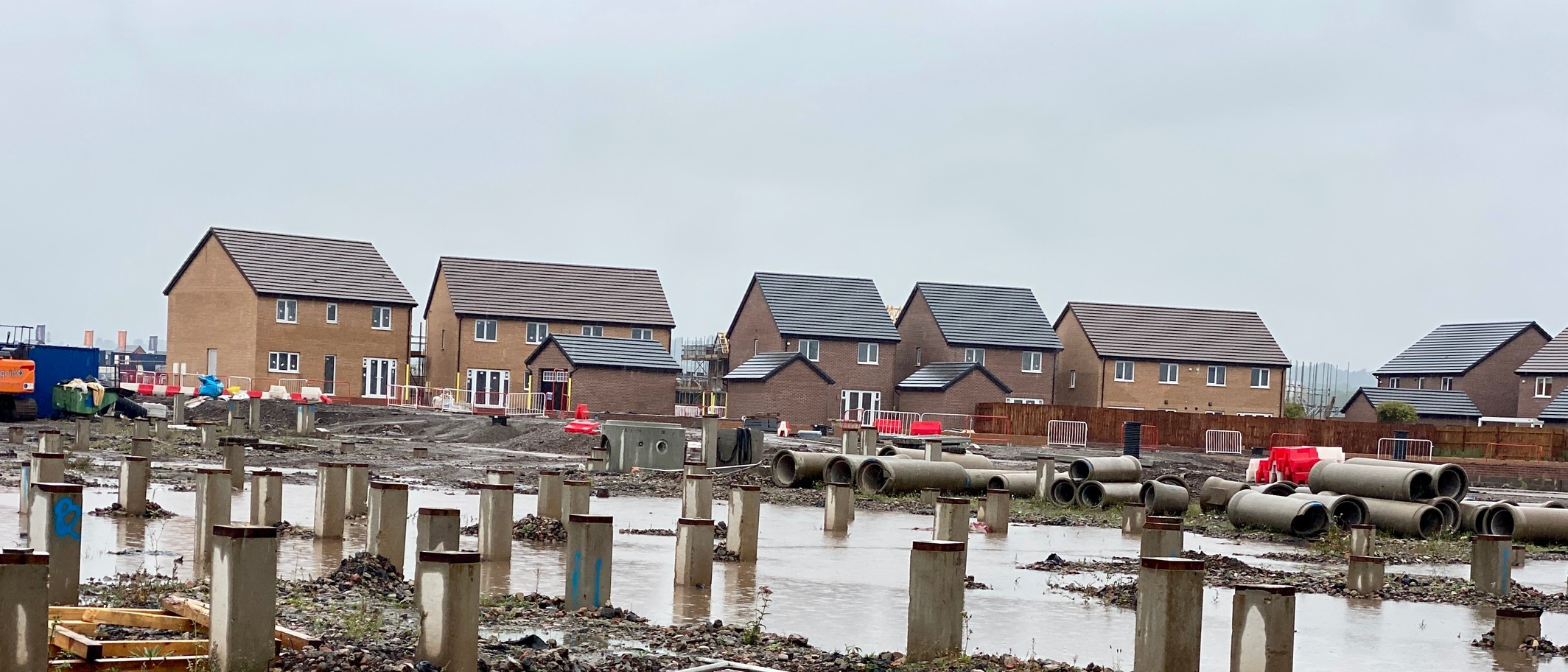 New homes going up in Llanwern, Newport, with foundation piles marking plots still to be built. Photo: Alan Hughes, CC BY-SA 2.0, via Geograph (geograph.org.uk/photo/7883867) and Wikimedia Commons
