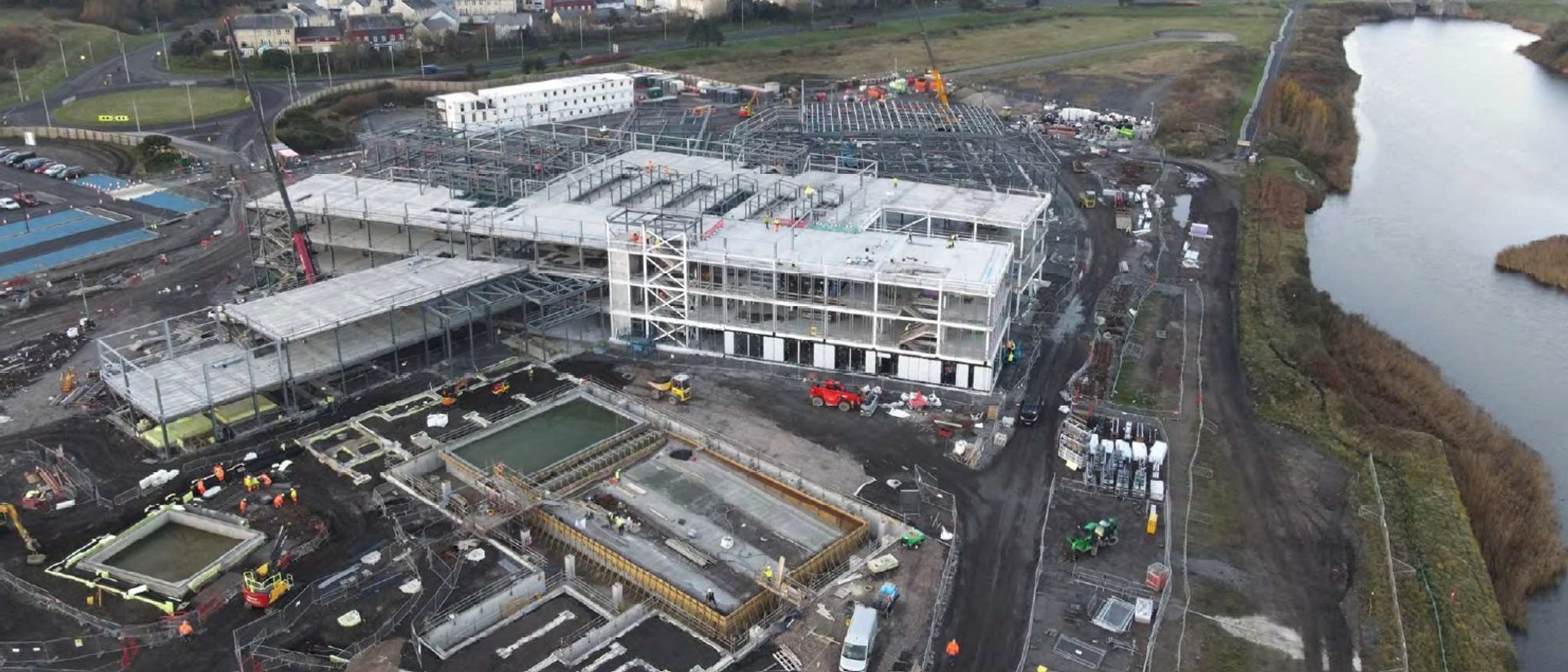 Archive: Pentre Awel under construction on 2 December 2023, before the centre opened. Carmarthenshire County Council / Wikimedia Commons, Open Government Licence v3.0; cropped or framed. Not the current building condition or anniversary event.