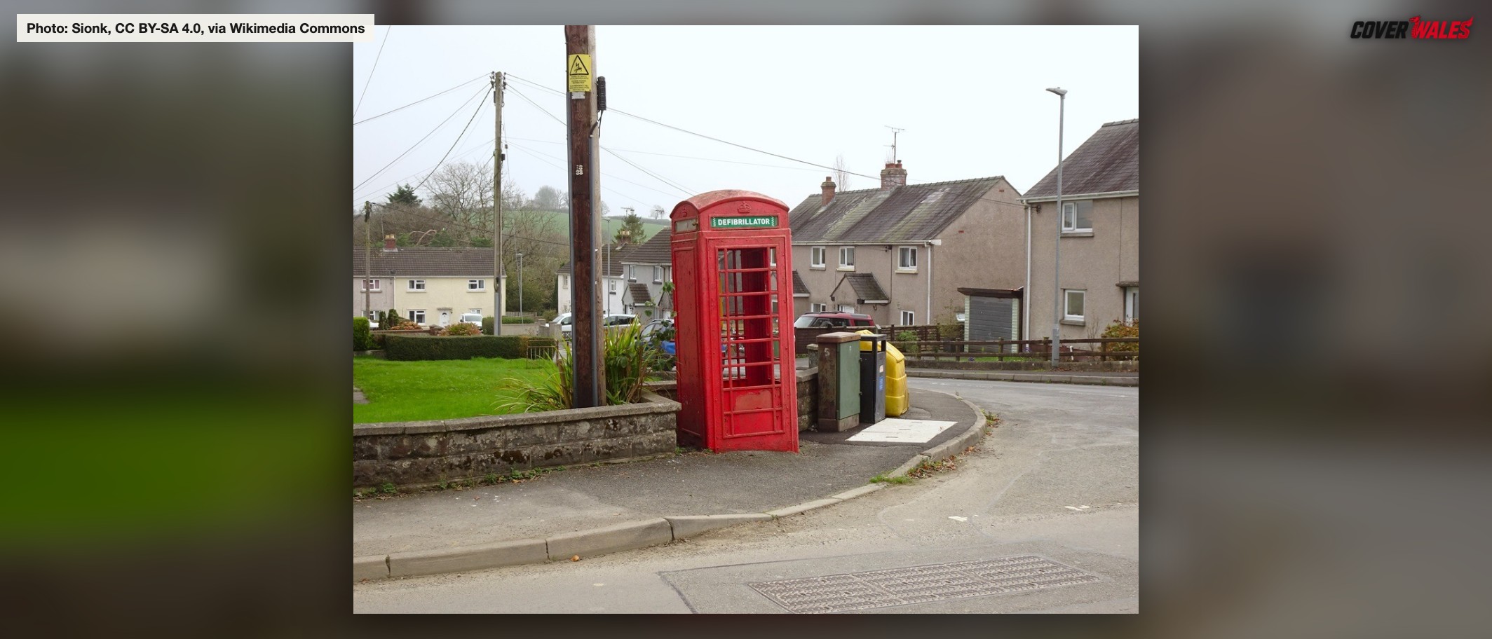 A telephone box housing a defibrillator in St Clears, 9 November 2024. Archive photograph: Sionk, CC BY-SA 4.0, via Wikimedia Commons.