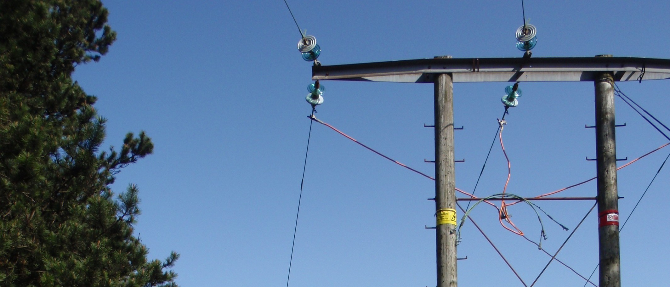 Archive: power lines overlooking Blaengarw, 10 April 2011. Photo: John Finch, CC BY-SA 2.0, via Wikimedia Commons. Not a photograph of Storm Austen damage.