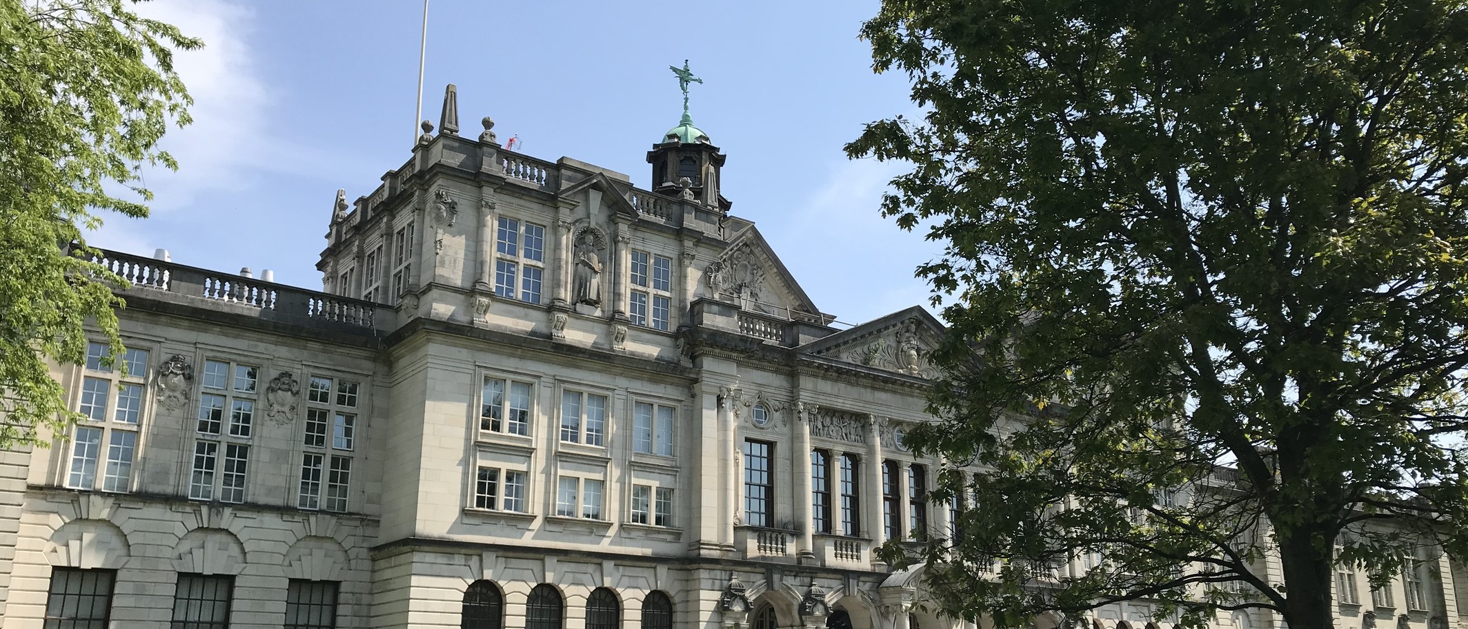 Archive photograph of Cardiff University Main Building from Museum Avenue, 9 May 2020. Photo: Armonjones, CC BY-SA 4.0, via Wikimedia Commons; cropped.