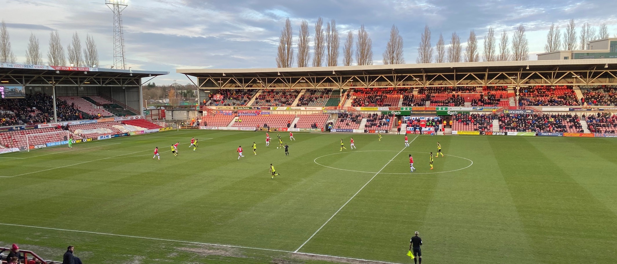 A match in play at the Racecourse Ground, Wrexham. Photo: John Lord from Edinburgh, Scotland, CC BY 2.0, via Wikimedia Commons