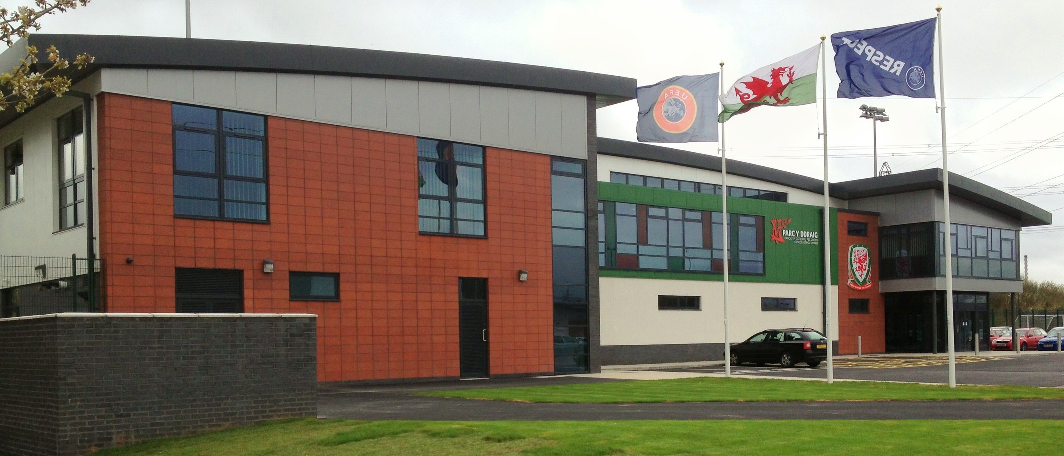 Dragon Park, the national football development centre in Newport, April 2013. Archive photograph, not the draw event: Pwimageglow, CC BY-SA 3.0, via Wikimedia Commons.